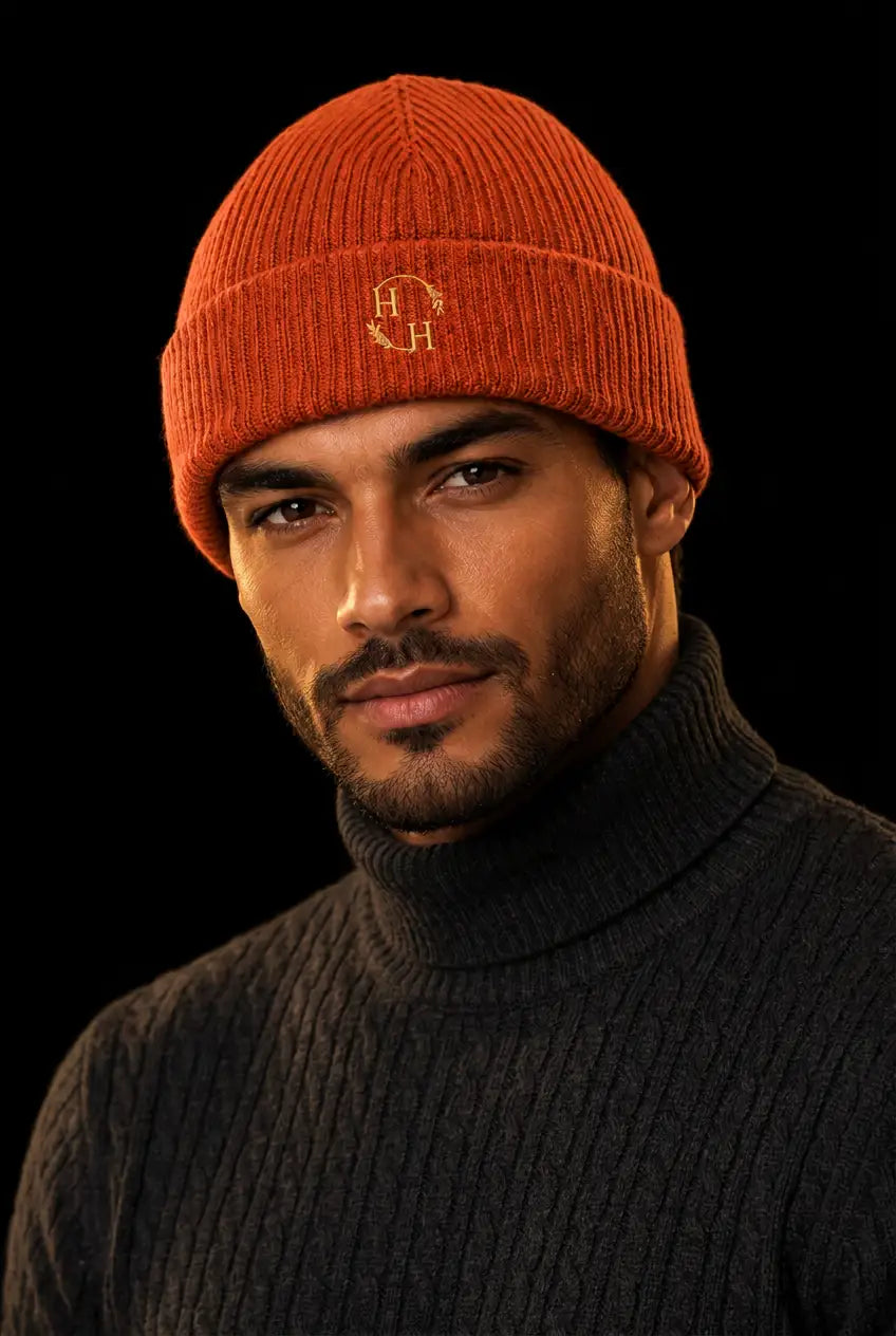 Persimmon beanie editorial portrait with the Nero cable-knit turtleneck